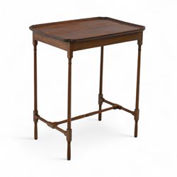 Early 20th century mahogany butler’s tray table, rectangular dished top with shaped corners, raised on turned faux bamboo legs with stretchers