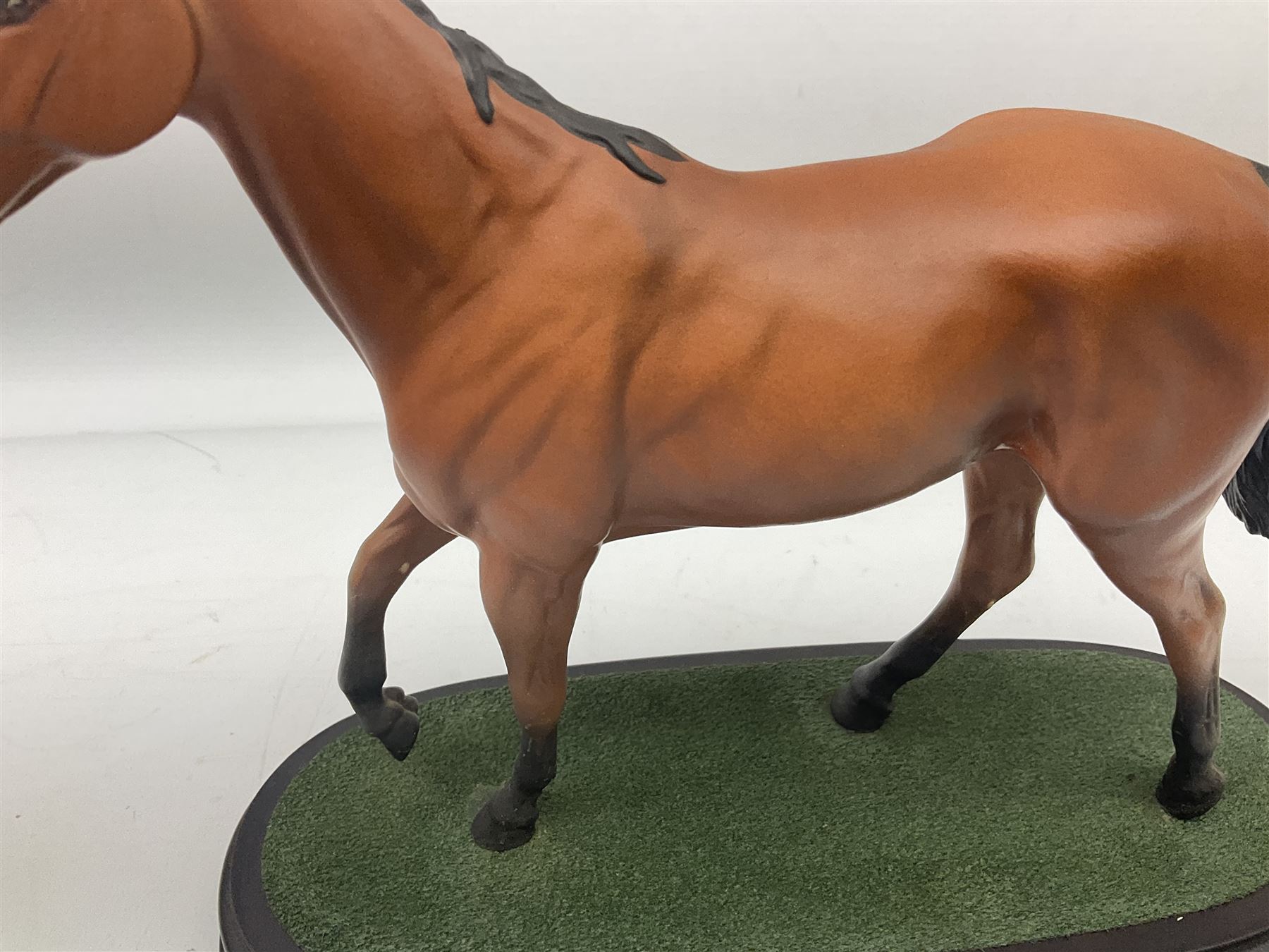 Beswick 'Mill Reef' horse figure, on a wooden plinth together with Beswick Ware horse figure 'Red Rum' on wood plinth, both with printed mark beneath