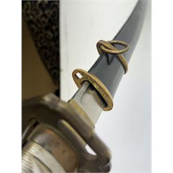 WWII Japanese katana with cast pierced tsuba, the L69cm arsenal steal blade marked 144559, with black lacquer Saya (scabbard), L97cm overall