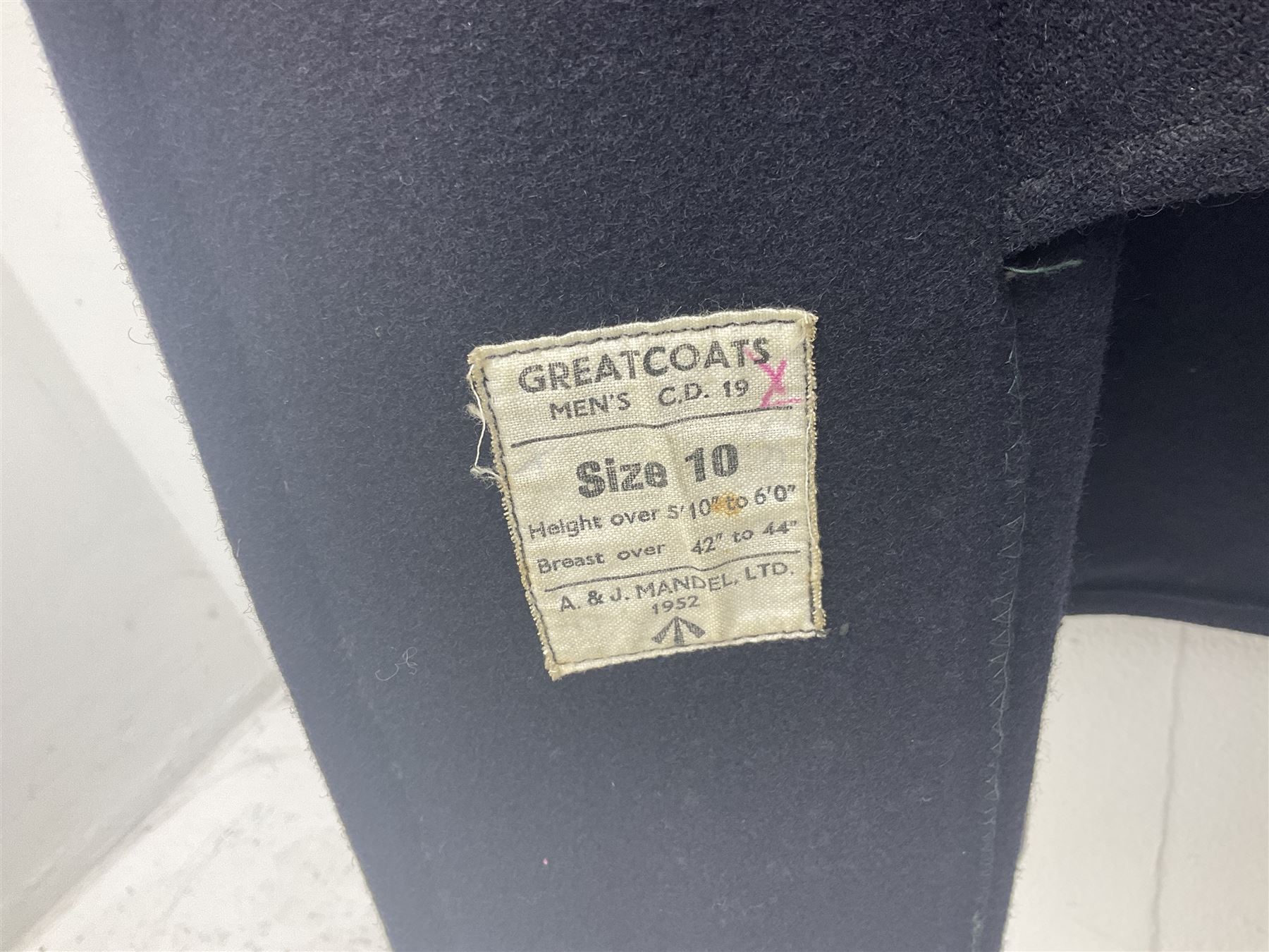 1950s British Red Cross North Yorkshire dress uniform comprising tunic, trousers, greatcoat and visor cap; bears manuscript label '1956 Ware'