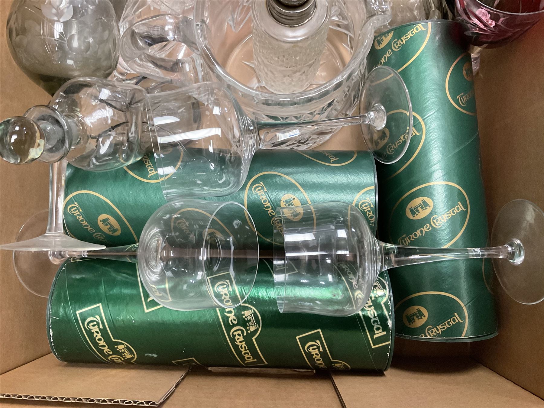 Caithness 'Fireball' paperweight, together with four cased Tyrone Crystal glasses, glass oil lamp, three glass decanters etc, in two boxes