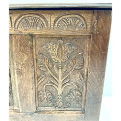 Early 19th century carved oak blanket box, single hinged lid, four carved panel front, stile supports 