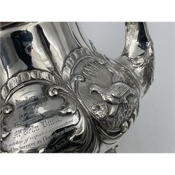 Victorian silver three piece tea service, comprising teapot, twin handled open sucrier, and milk jug, each of bellied form with acanthus capped scroll handles, the sides embossed with alternating scroll edged vacant panels and panels containing a pair of birds, upon four palmette feet, the teapot with ivory insulators to handle, and bird finial to the hinged domed cover, hallmarked William Hunter & Son, London 1861, teapot H19cm, including handles sucrier H13.5cm, including handle milk jug H12cm

This item has been registered for sale under Section 10 of the APHA Ivory Act