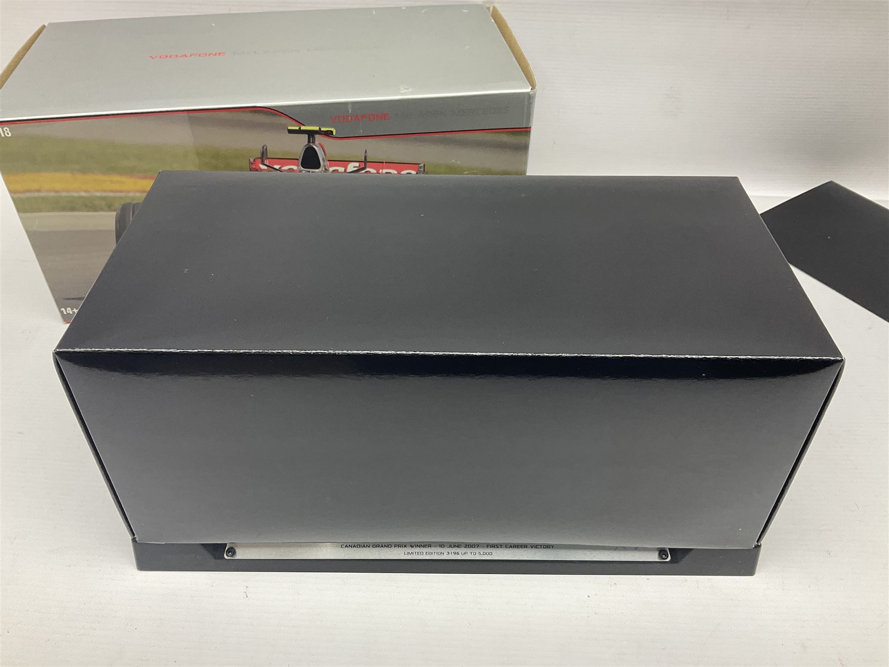 Mattel Hot Wheels 1:18 scale die-cast racing car - Vodaphone McLaren Mercedes; boxed with stand