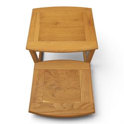 Contemporary light oak nest of two tables, and a contemporary light oak side table, fitted with single drawer