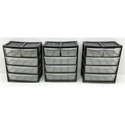 Three plastic chest storage units, two short and three long drawers