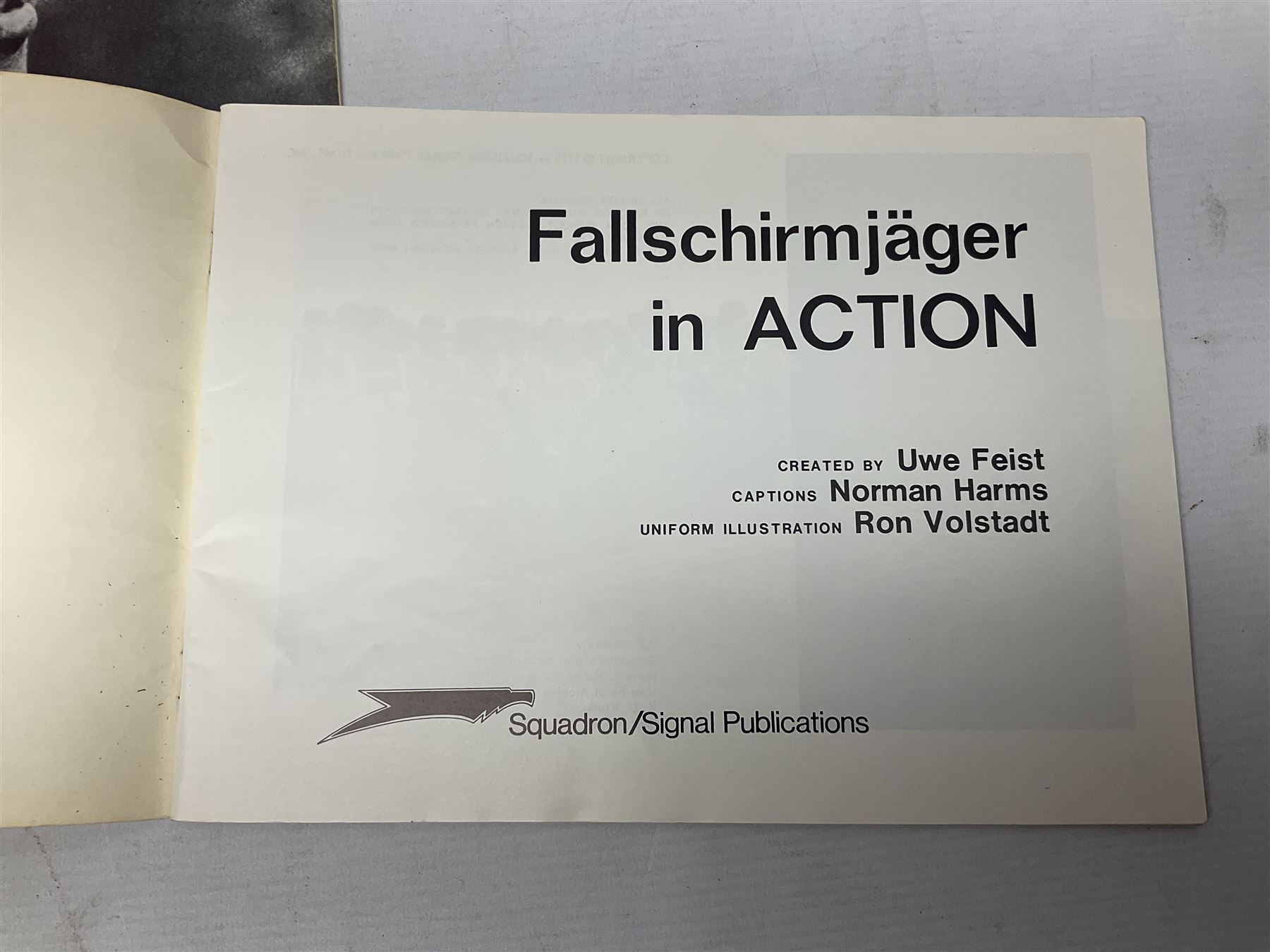Adolf Hitler, Bilder aus dem Leben des Fuhrers [Pictures from the Life of the Fuhrer], Herausgegeben vom Cigaretten / Bilderdienst, Hamburg / Bahrenfeld, 1936, an album of two hundred tipped-in cards bearing photographs by Heinrich Hoffman, originally collected with cigarettes, 31 cm x 24 cm; together with a Waffen-SS book 'Wenn alle Bruder schweigen'; Hamburg 1939-1945; and two other booklets