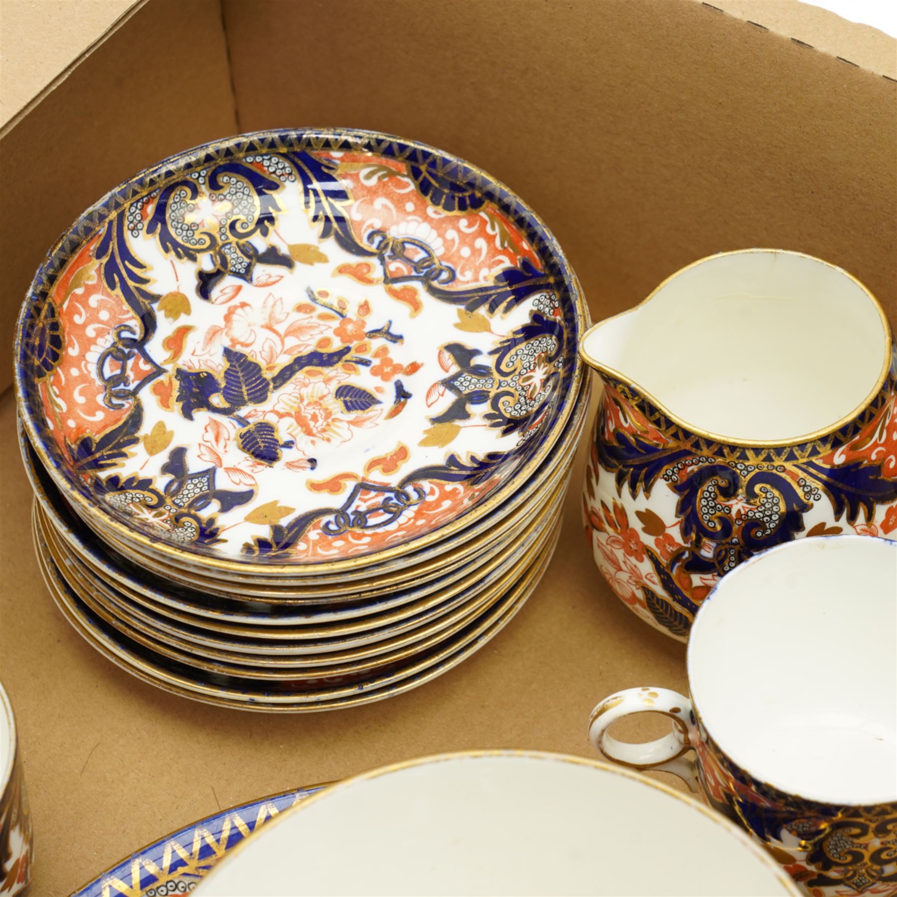 Victorian Samuel Radford Imari pattern part tea service, comprising eleven saucers, eleven cake plates, etc 