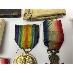 WWI pair of medals comprising British War Medal and Victory Medal awarded to 32682 Pte. W. Meadows W. Rid. R. in issue box; WWI pair of medals comprising 1914-15 Star and Victory Medal awarded to 3720 Pte. (later Cpl.) E. Petty W. York. R. with issue letter from Tank Corps; WWII group of five medals comprising 1939-45 War Medal, Defence Medal and 1939-45, Italy and Africa Stars; all with ribbons; and book of nineteen seaman's Certificates of Discharge to cook Charles Filburn 1893 - 1901 from various British ports