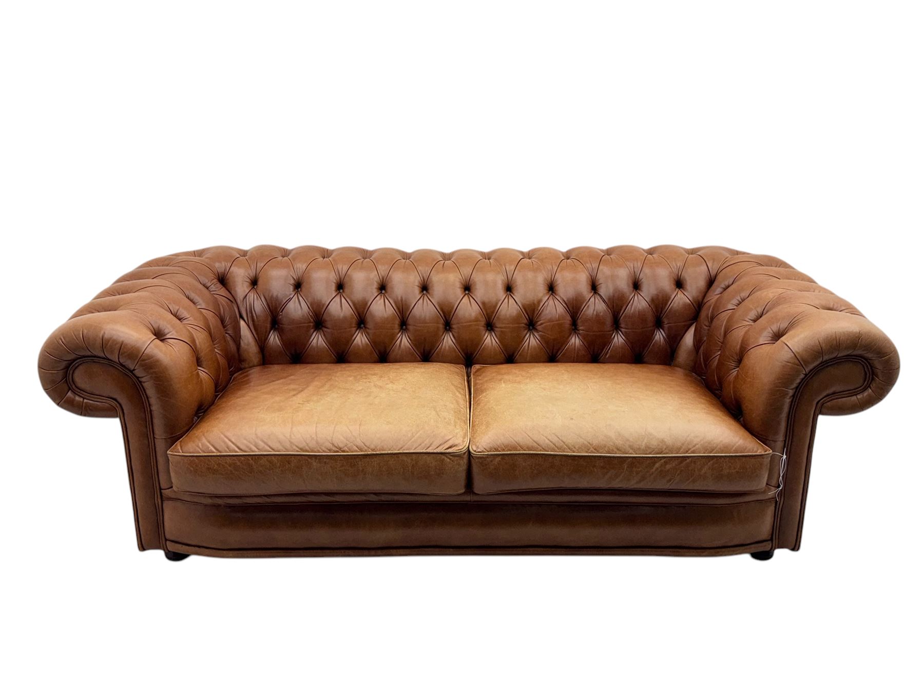 Springvale - large Chesterfield sofa, upholstered in buttoned tan leather, two cushion deep seat, turned bun feet