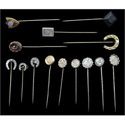 Collection of fourteen Victorian and later silver and gilt stick pins including horseshoe, birds s and stone set