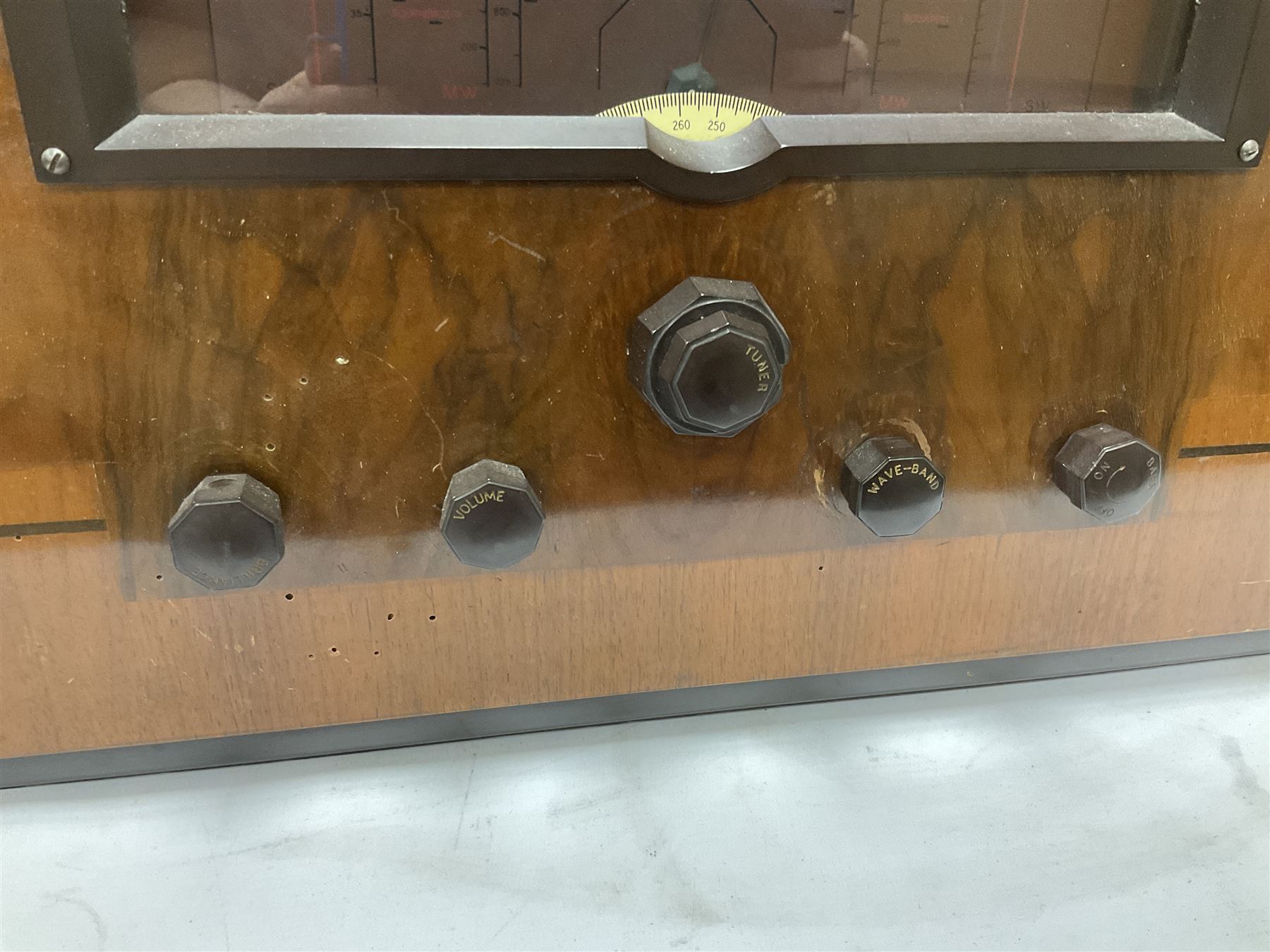 1930s Marconi Type 561 valve radio, in shaped Art Deco case with woven brass overlaid speaker, circa 1937, H58cm W50cm