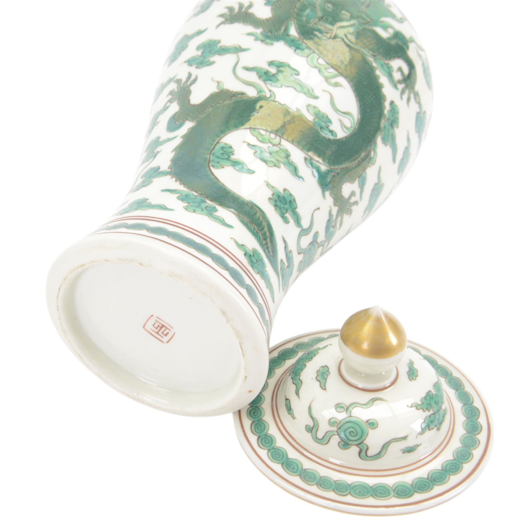 Pair of Chinese famille verte vases and covers, each of baluster form, decorated with dragons and flaming pearls amidst auspicious clouds, with mark beneath, H31cm