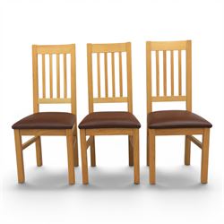 Modern solid oak dining table with set six chairs, chairs with brown leatherette seat