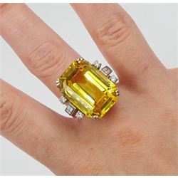 Palladium natural yellow sapphire ring, set with three baguette and round cut diamonds either side, sapphire approx 28.00 carat, with The Gem & Pearl Laboratory report stating no evidence of heat treatment, origin opinion Sri Lanka, colour transparent yellow