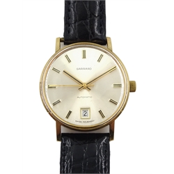 Garrard 9ct gold gentleman's automatic wristwatch, with date aperture, presented by Ford to C Jackson, hallmarked London 1976, on leather strap in original Ford case