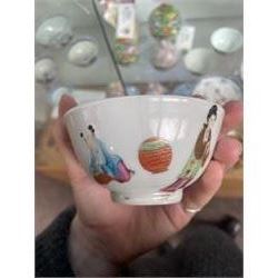 Group of eight 18th century and later Chinese famille rose and similar painted teabowls and dishes, to include unmarked peony cup, small cup decorated with flowers and butterfly, cup decorated with female figure gazing out of a window in a Buddhist temple with indistinct square character mark to base, pair of saucers unmarked, and others with character scenes unmarked (8)