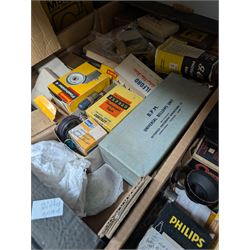 Collection of photography and photograph development accessories, including bulbs, development tanks, trays, projector lenses, etc