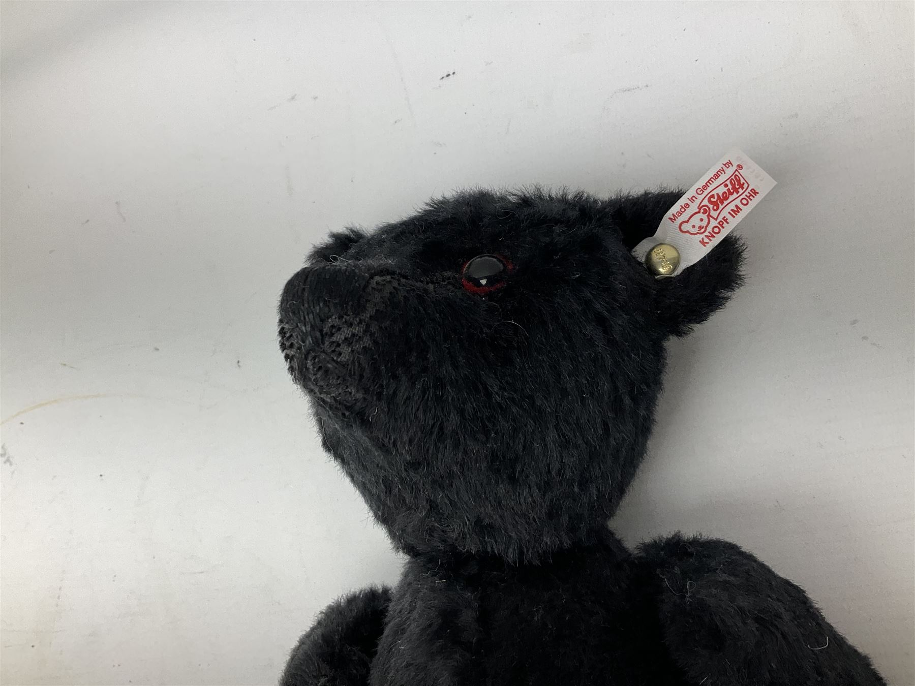 Steiff 'Leo the 1912 Titanic Mourning Bear', in black mohair with tag, limited edition no. 605, with original certificate and box