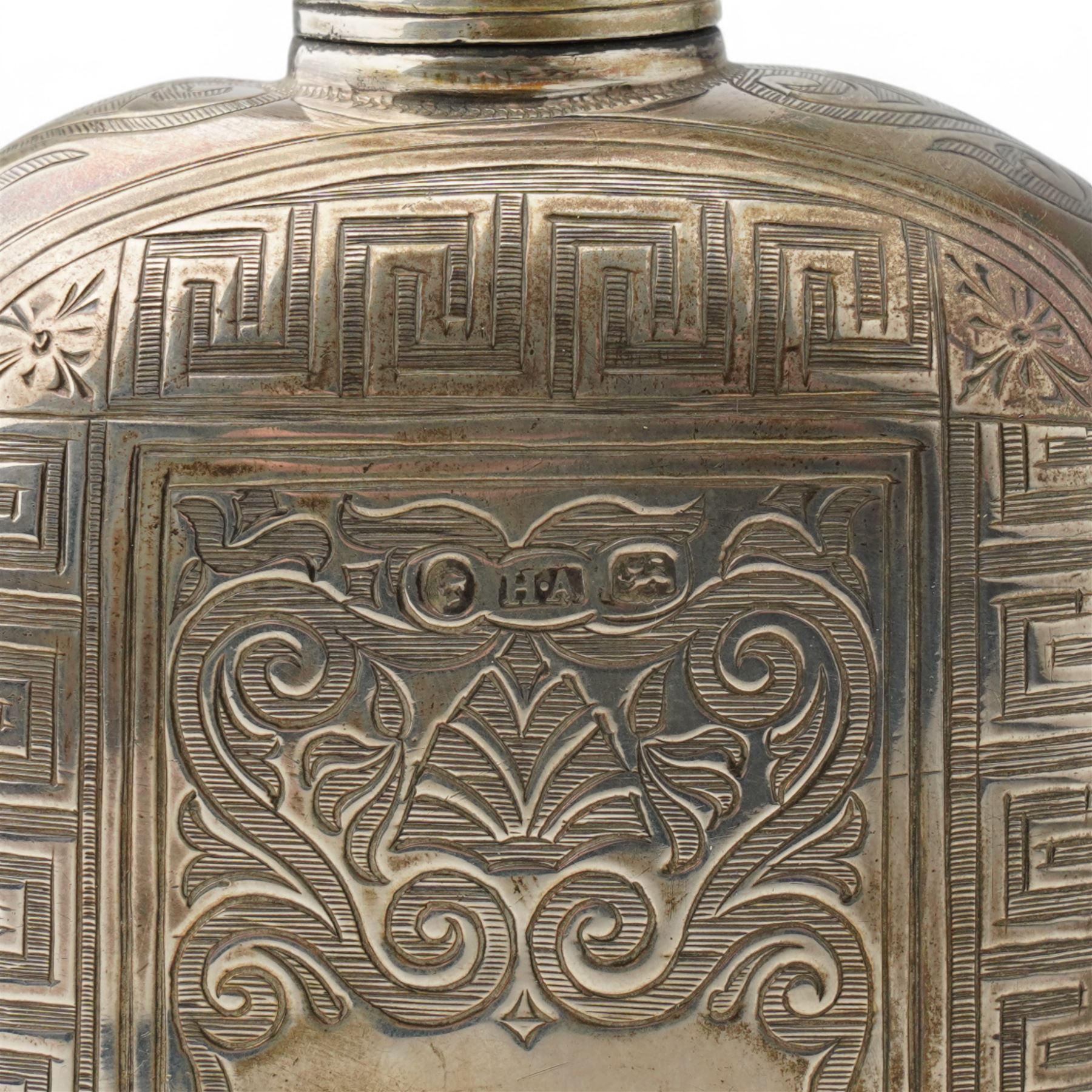 Victorian silver hip flask engraved with scrolls and vacant cartouche within a key pattern border, screw off cap 12cm Birmingham 1862 Maker Henry Hyde Aston