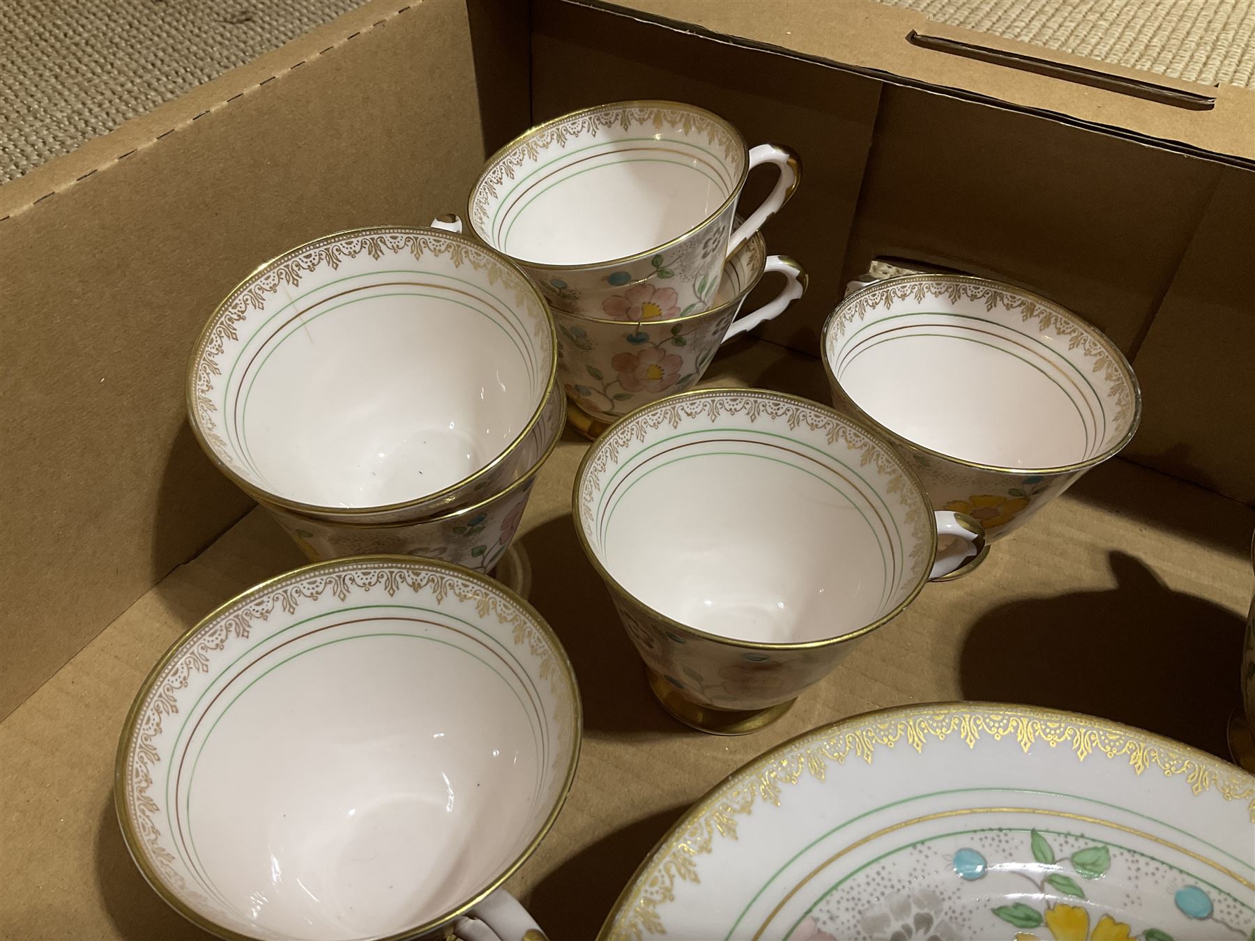 Paragon tea wares decorated in the 'Country Lane' pattern, Plant Tuscan tea set for nine, the pink ground with flower and gilt decoration, Wedgwood 'Mayfield' coffee wares etc in two boxes