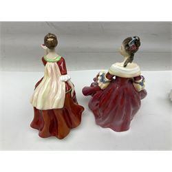 Five Royal Doulton figures, comprising Flower of Love HN3970, Emily HN3688, Southern Belle HN2229, Helen HN3886 and My Love HN2339, all with printed mark beneath, some with boxes, together with a Royal Doulton Figures reference book by D Eyles and R Dennis