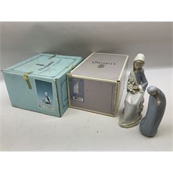 Four Lladro figures, comprising Afternoon Promenade no 7636, Nostalgia no 5071, both with original boxes, Girl with Lilies no 4972 and Madonna no 4534, largest example H27cm
