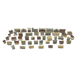 A collection of forty eight Wade miniature buildings, to include The Picture Palace, Mick Murphy bar, Tony Barber, W Ryan hardware store, District Bank, and S Farthing Antiques, etc. 