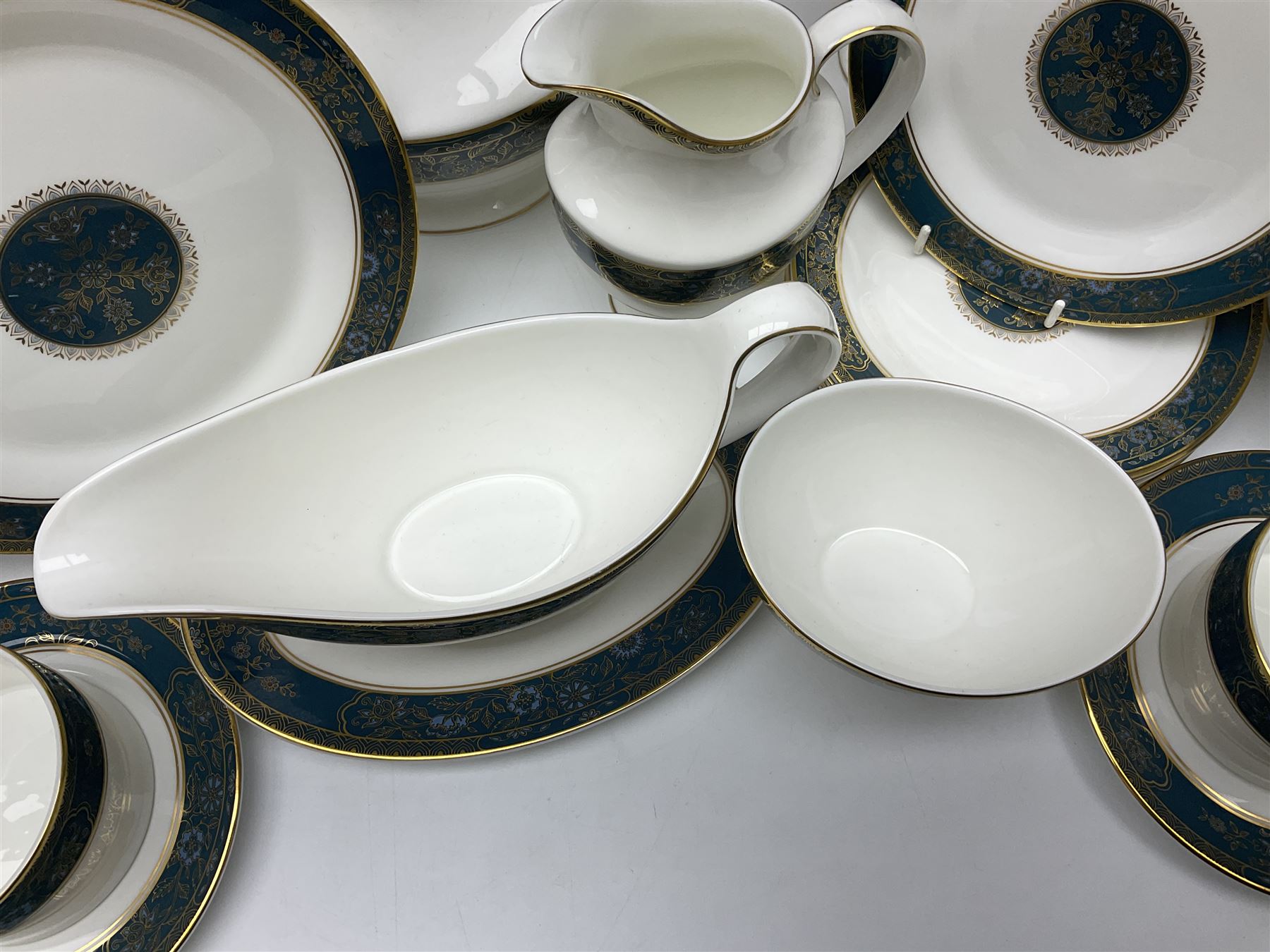 Royal Doulton Carlyle pattern tea and dinner service for six, to include teapot, coffee pot, teacups and saucers, coffee cups and saucers, milk jug, open sucrier, dinner plates, side plates, bowls, soup bowls, to covered dishes etc (64) 