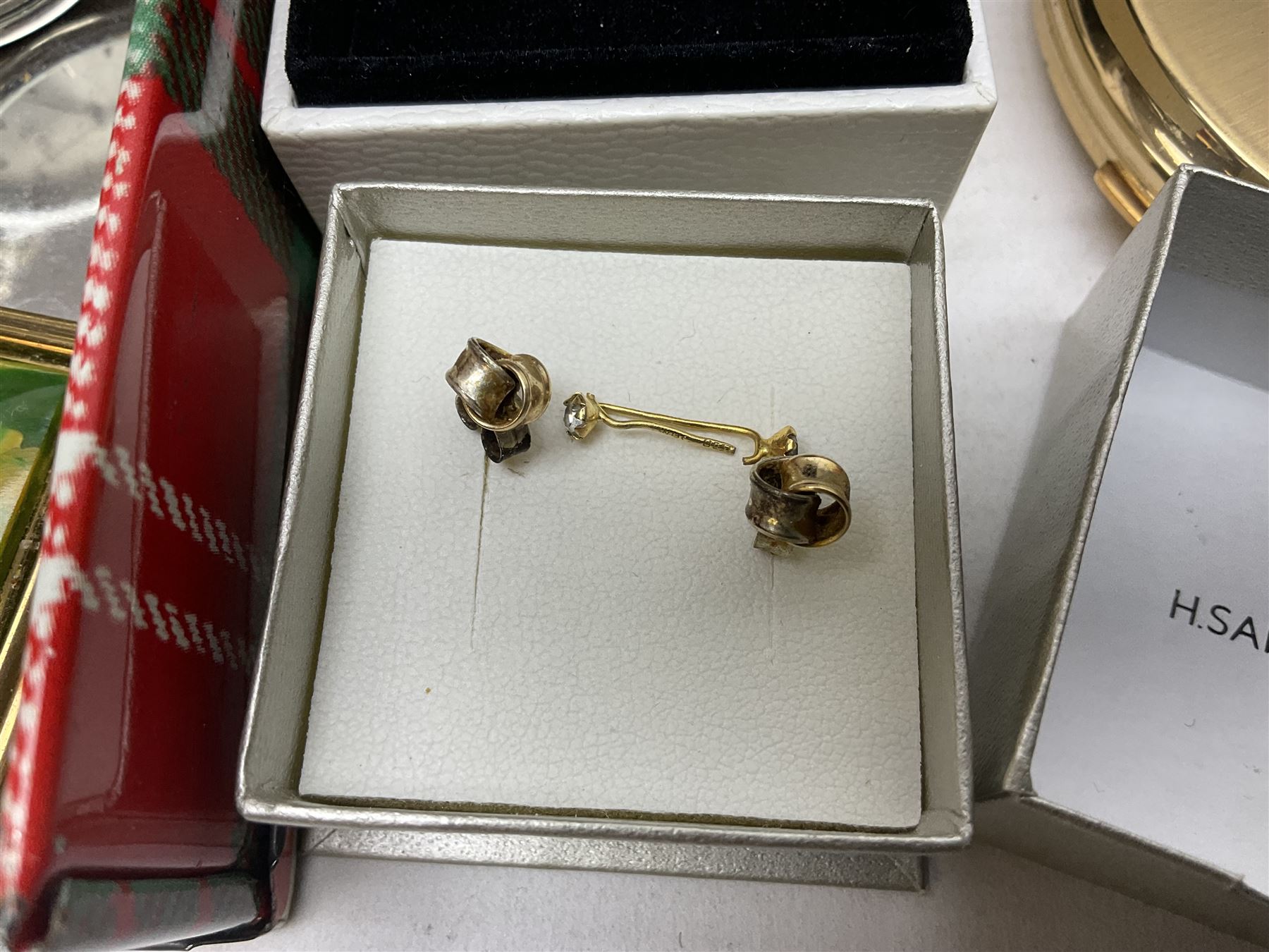 9ct gold bangle, hallmarked, pair of Pandora silver infinity earrings, 9ct gold stone set studs, other silver jewellery, costume jewellery, Stratton compact mirror and a Vincenza glass basket