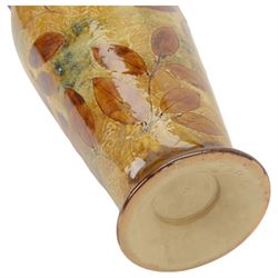 Early 20th century Royal Doulton Autumn Leaves pattern vase, of baluster form with fluted rim, impressed with maker's mark, designers initials and number 7559 beneath, H40cm