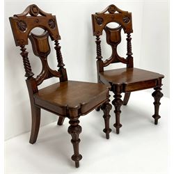 Pair 19th century oak hall chairs, carved and pierced backs, solid seat, turned tapering supports