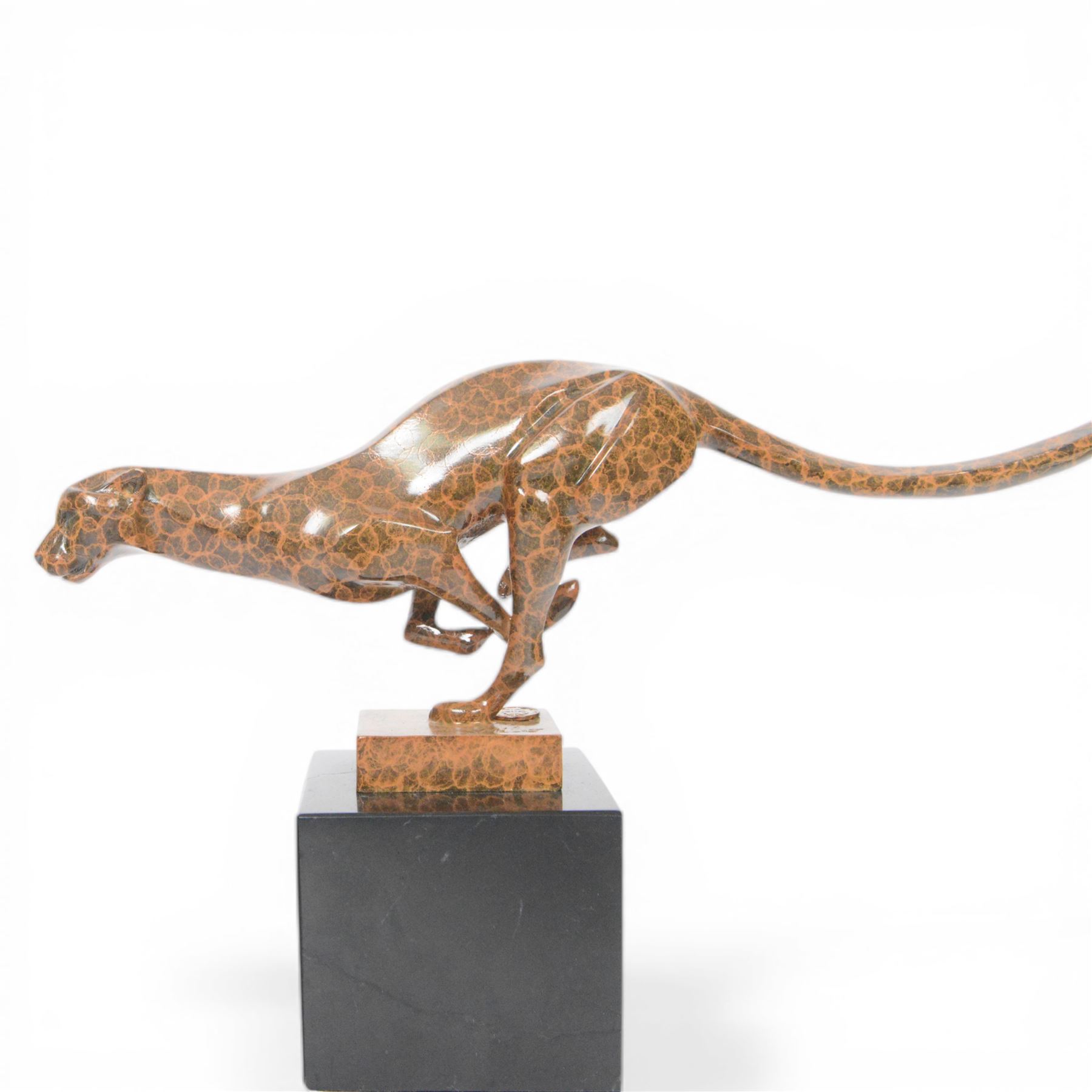 Sprinting Cheetah, bronze two toned figure of running cheetah, upon a rectangular marble base, signed milo and with foundry mark, H20cm