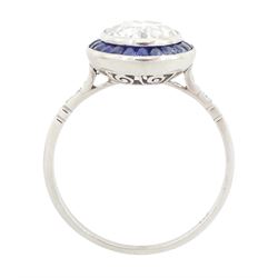 Platinum diamond and sapphire target ring, milgrain set single old cut diamond of 1.53 carat, with calibre cut sapphire surround and rose cut diamond set shoulders, stamped 950