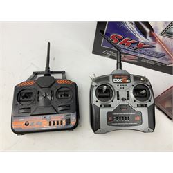 Sky Challenger game of strategy and flying skill by PicooZ Silverlit Electronics, Spektrum DX5E five channel radio control handset and other collectables 