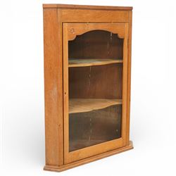 Yorkshire oak corner cabinet, chamfered triangular top above a single glazed door with sha...