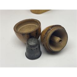 Collection of Mauchline ware relating to sewing, to include four ovoid shaped thimble cases, hinged lid thimble case and needle cases (12) 