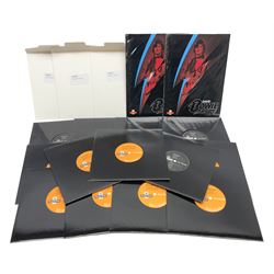 Fifteen Royal Mail David Bowie Fan Sheet presentation sets, housed in presentation wallets in the form of vinyl records, together with two Royal Mail limited edition David Bowie stamp art souvenir folders, sealed, and three David Bowie: The Berlin Years limited edition souvenir covers