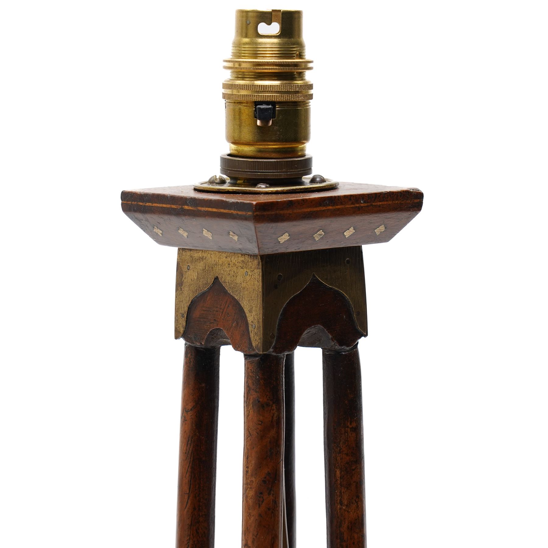 Early 20th century Arts and Crafts style Anglo-Indian table lamp, with open twist stem and gilt brass inlaid trailing vine and repeating arch pattern overall H53cm