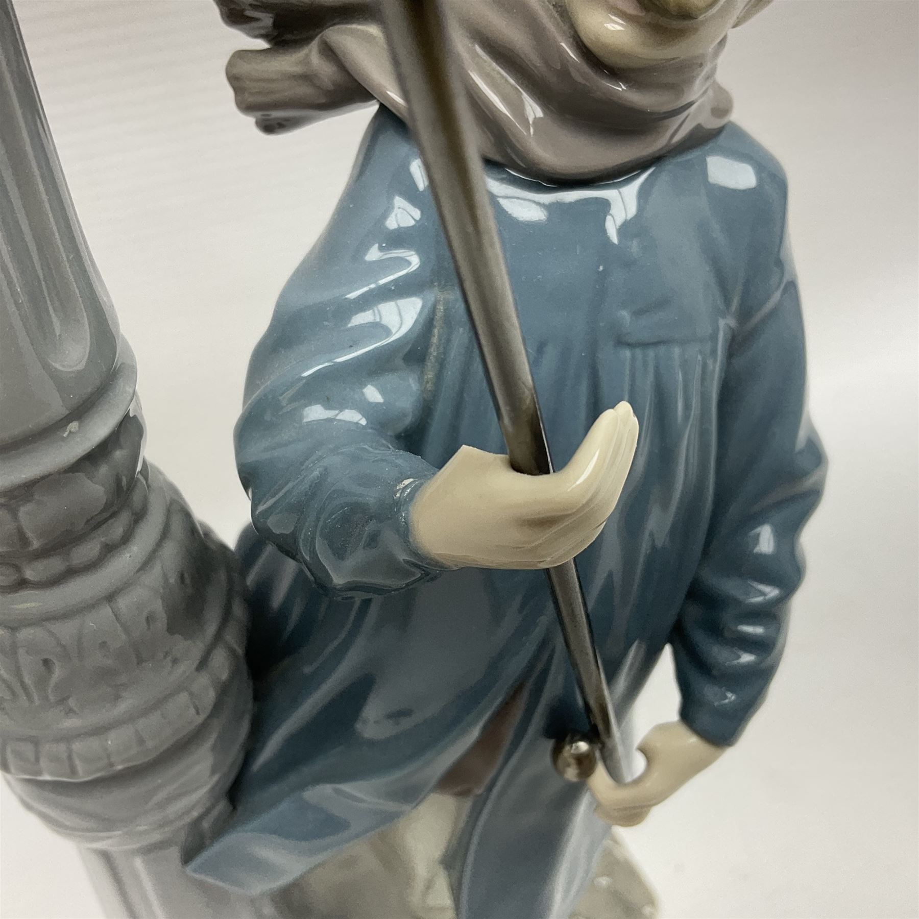 Five Lladro figures, including The Lamp Lighter no 5205,  Girl and Kittens no 6102, Cat no 5113 etc