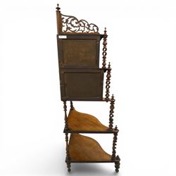 Victorian mahogany five-tier corner whatnot, raised and pierced back of scrolling foliate design, over two tiers with mirror backs and pear-drop moulded aprons, united by pierced spiral-turned uprights, on turned feet