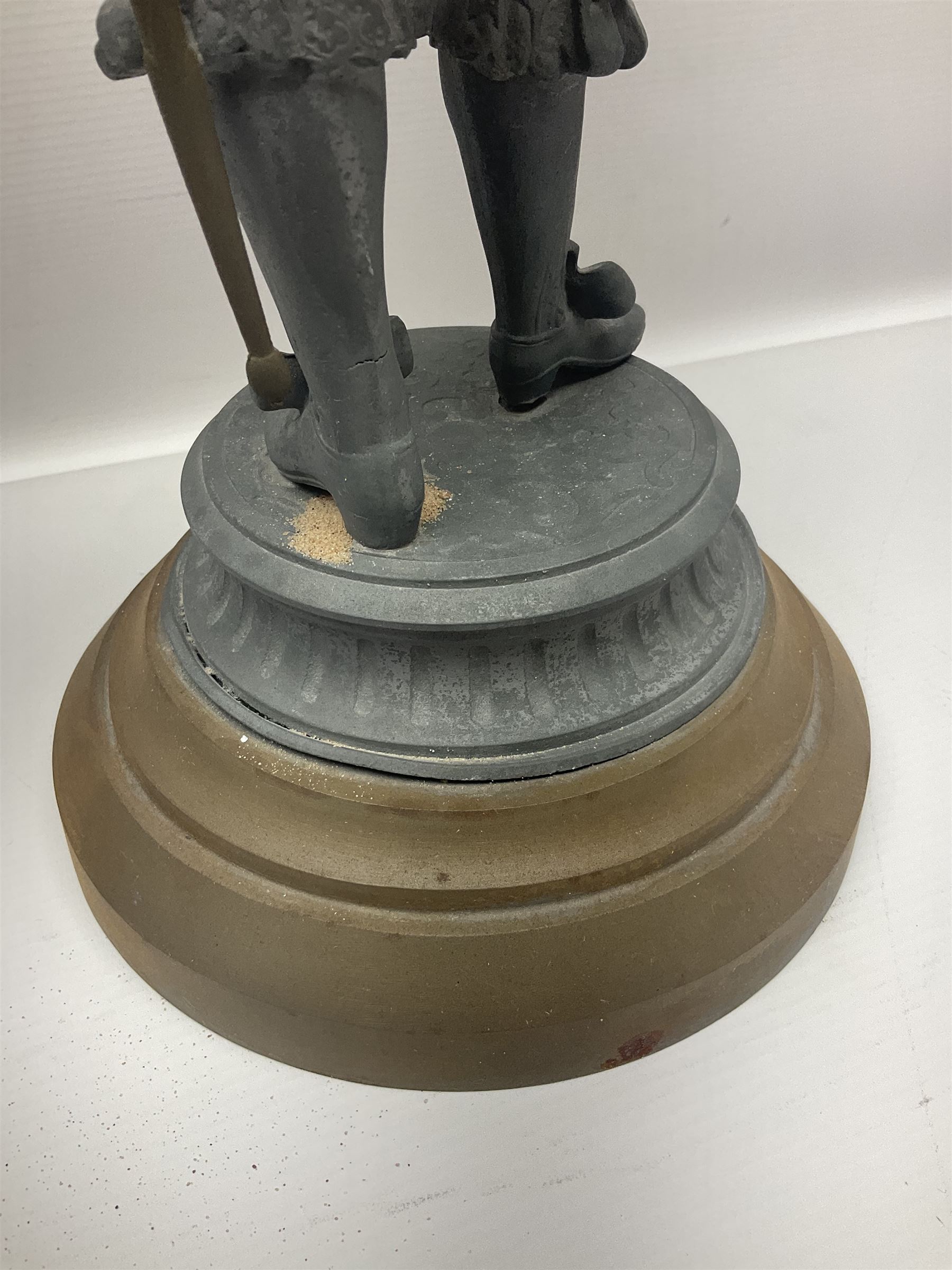 Pair of spelter figures modeled as Cavaliers, together with a spelter figure of Joan of Arc, largest H52cm