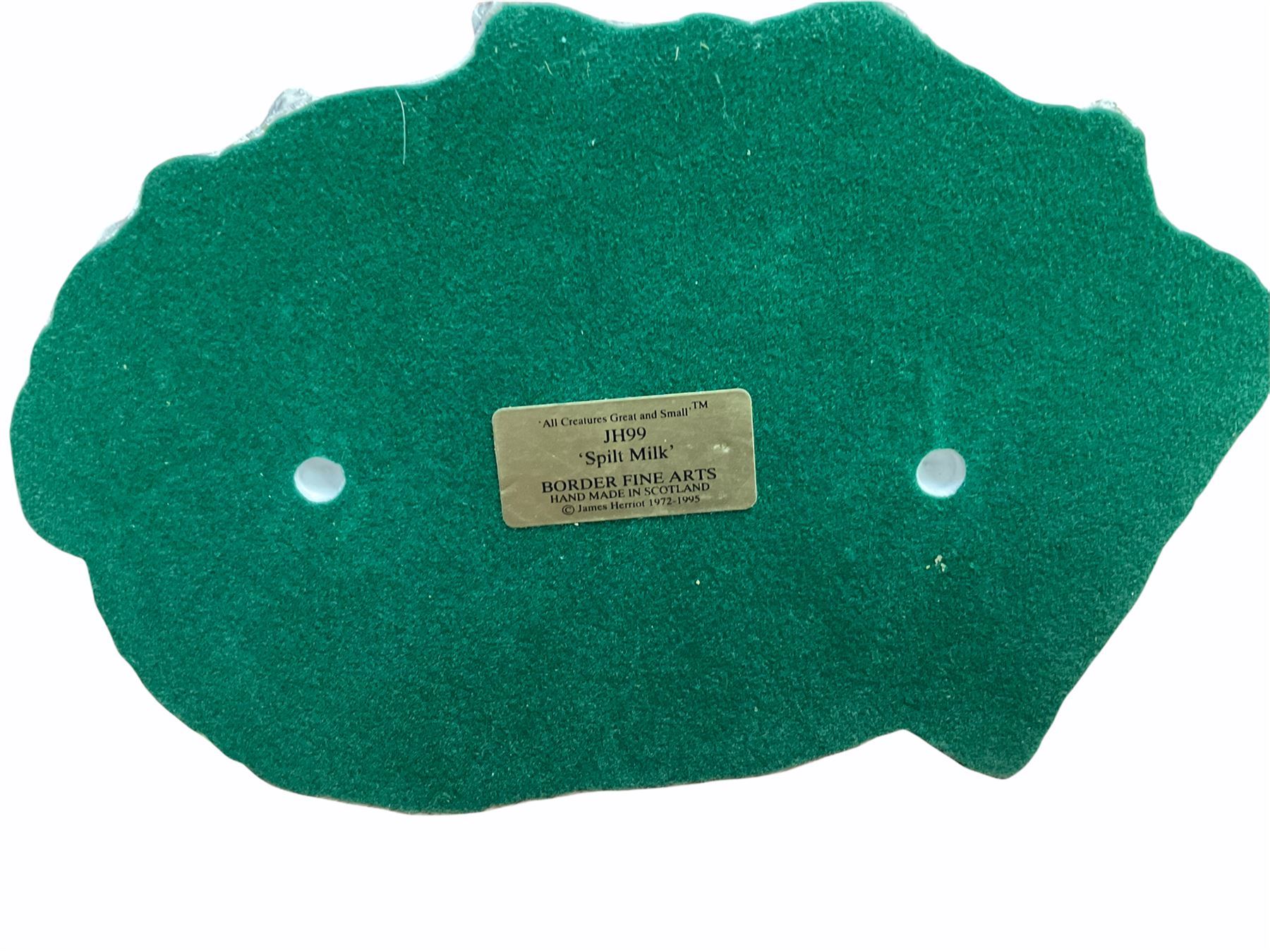 Border fine arts figure, Border collie, model no MT07, by M Turner H22cm, along with Border fine arts figure Spilt milk, model number JH99, by Ray Ayres H15cm.