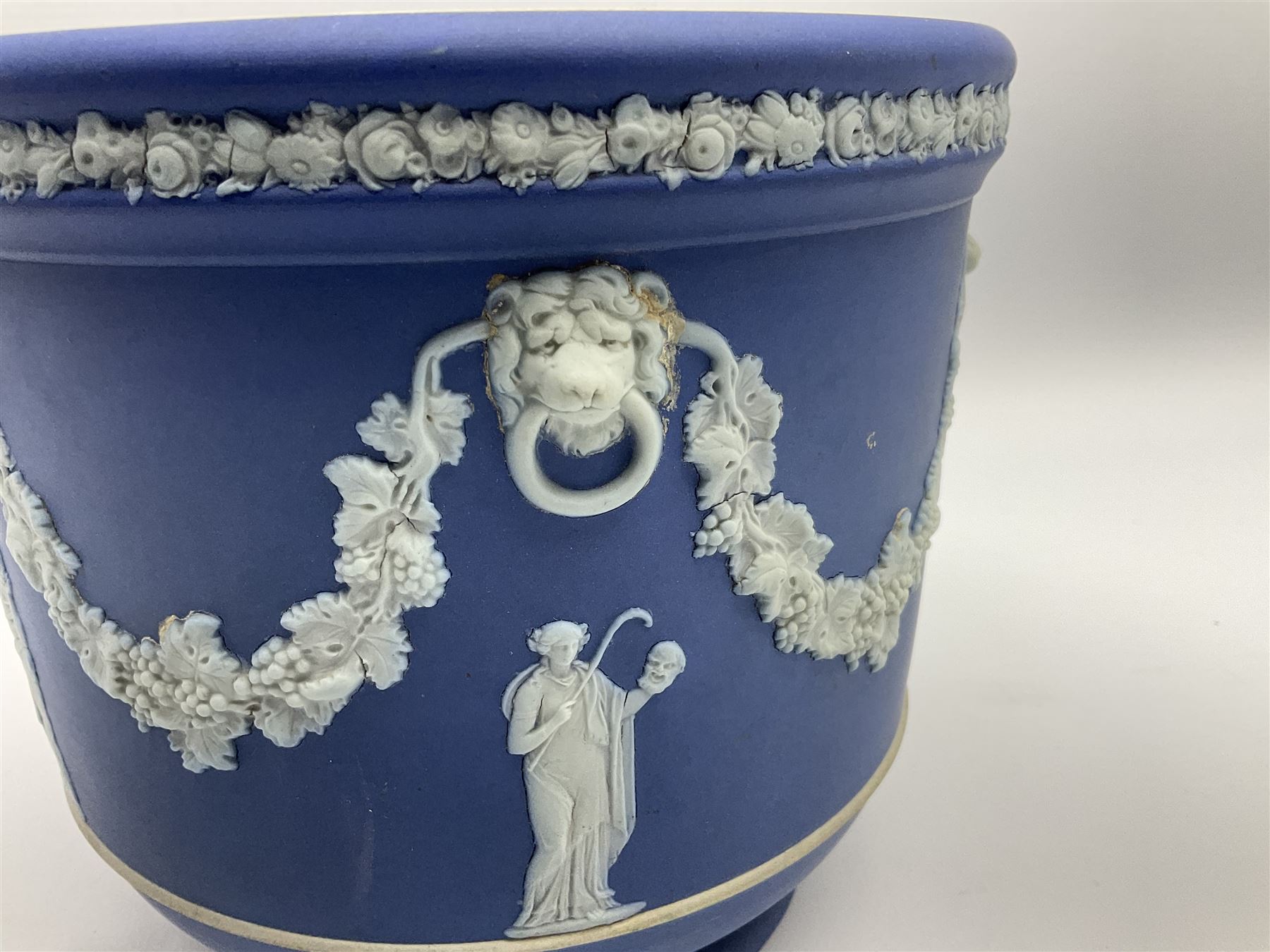 Victorian Wedgwood blue jasperware jardiniere H16.5cm; Victorian copper lustre jug; James Kent art deco style green glazed jug; and Beswick figure of a singing cat (4)