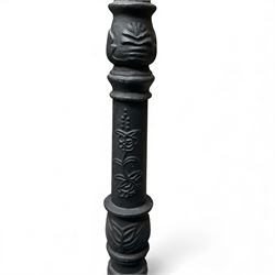 Victorian-style cast iron lamp post in a black finish,