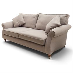 Next - contemporary four-seater sofa, upholstered in lilac fabric, square back with scrolled arms, fitted with two loose seat cushions and two loose back cushions, with arm cushions, raised on turned feet 