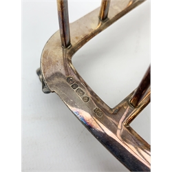Victorian electroplate Gothic style toast rack, with seven arched bars, openwork handle and arcaded bracket feet, marks for John Gilbert, H25cm   