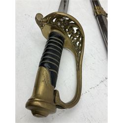 Reproduction American Civil War Cavalry trooper's sword, the 88cm slightly curving fullered steel blade marked to the ricasso 'Ames & Co Chicopee Mass.' and 'US ADK 1862'; brass hilt and leather covered grip; in steel scabbard L110cm overall;  and another reproduction sword (2)