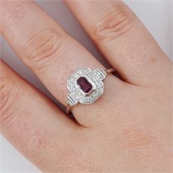 Platinum ruby and diamond ring, single octagonal cut ruby of approx 0.60 carat, with milgrain set round brilliant cut diamond surround and baguette cut diamond shoulders, hallmarked, total diamond weight approx 0.45 carat