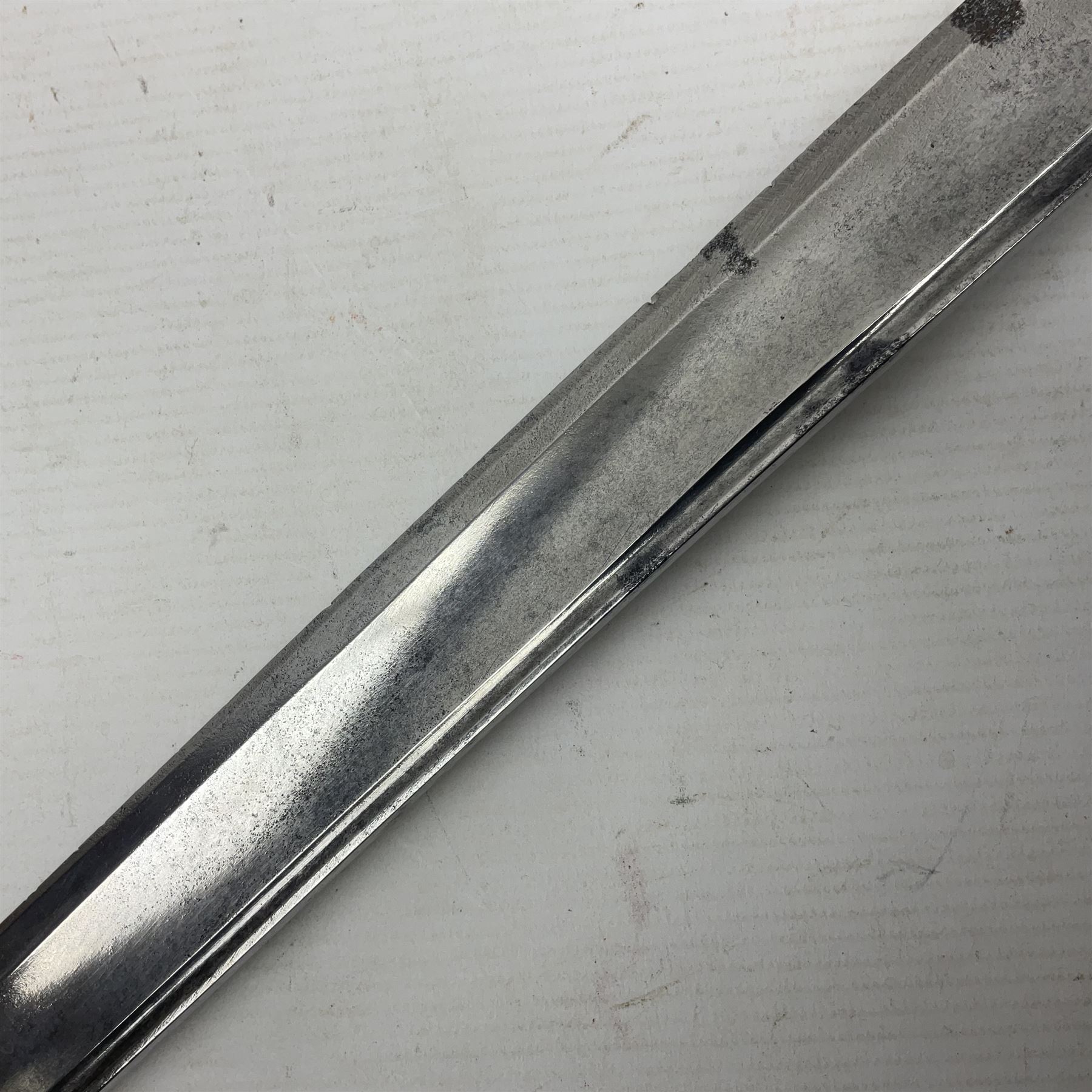 Late 18th century French 1st Empire Troupe a Pied Petit Montmorency Branch Tournante officer's sword, with 72.5cm slightly curving fullered blade, pierced brass hilt with lockable swivelling bar, fully wire-bound grip with lion head pommel, L88cm overall (no scabbard)